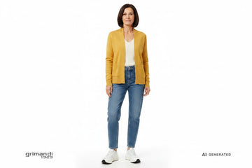 Outfit 2 – Cardigan scialle burro con maglia avorio e jeans medio wash rilassato
