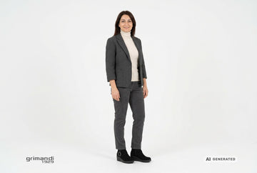 Stivaletti Melluso donna indossati con giaccone lana antracite, dolcevita panna e pantaloni velluto grafite. Outfit 1