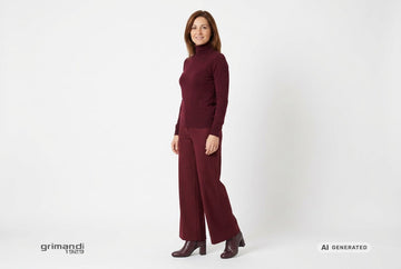 Stivaletti Melluso donna indossati con dolcevita cashmere bordeaux e pantaloni palazzo in panno morbido tono su tono. Outfit 2