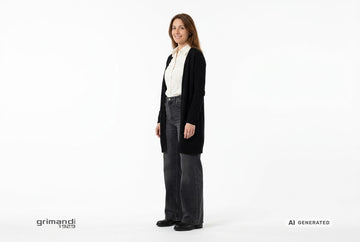 Stivaletti Melluso donna indossati con cardigan cashmere nero, camicia twill panna e jeans ampi denim antracite. Outfit 2