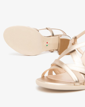 NeroGiardini Gold Laminated Leather Sandals with Criss-Cross Straps