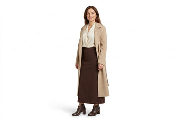 Stivaletti Melluso donna indossati con cappotto lana sabbia, sottogiacca panna e gonna lunga fluida in cady cioccolato. Outfit 1