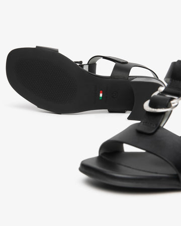 NeroGiardini Women's Black Leather Sandals with Metallic Rings